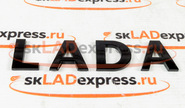Шильдик надпись lada нового образца, черный лак на подложке-трафарете